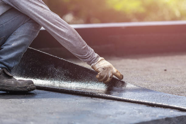 Professional Emergency Waterproofing technician working in Abbotsford, WI